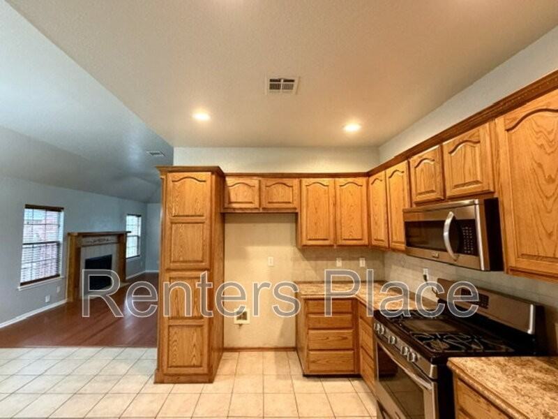 12169 N 107th East Pl - Photo 3 of 20