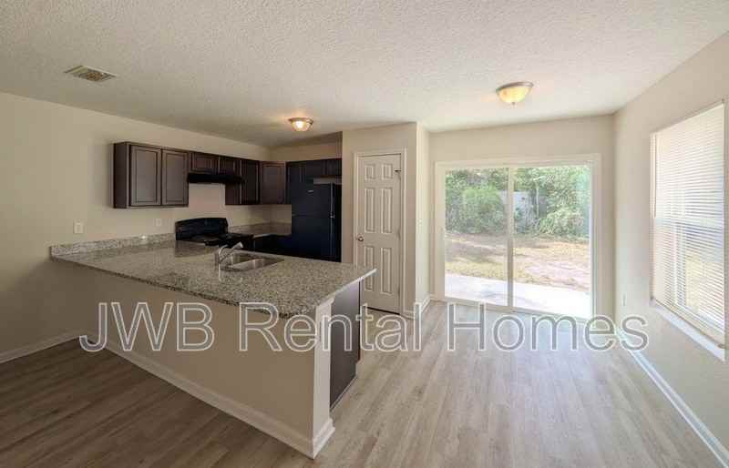 7800 Playschool Ln - Photo 2 of 19