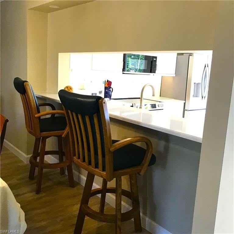 3032 Sandpiper Bay Cir #G203 - Photo 4 of 15