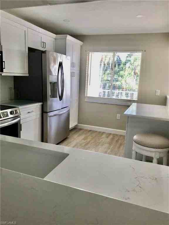 3032 Sandpiper Bay Cir #G203 - Photo 6 of 15