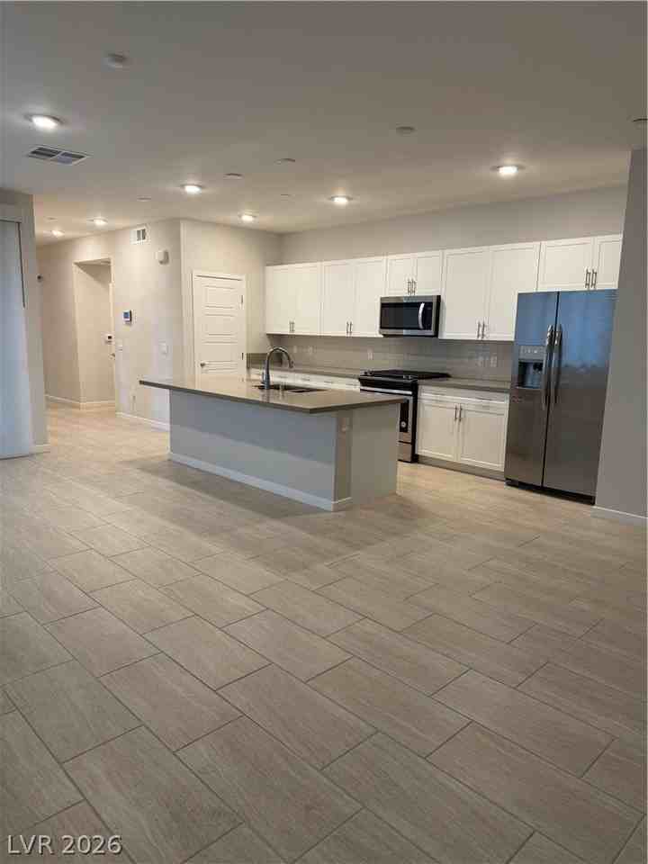 11429 Rain Canyon Ave #102 - Photo 4 of 18