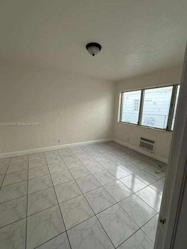 725 83rd St #2 - Photo 4 of 10