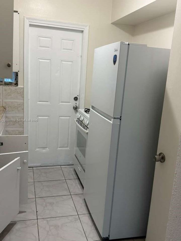725 83rd St #2 - Photo 5 of 10
