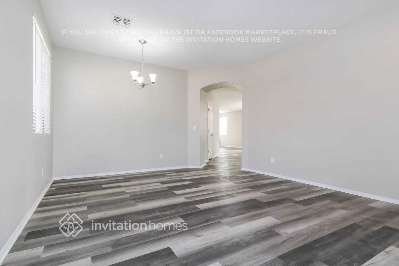 12420 W Woodland Ave - Photo 4 of 16