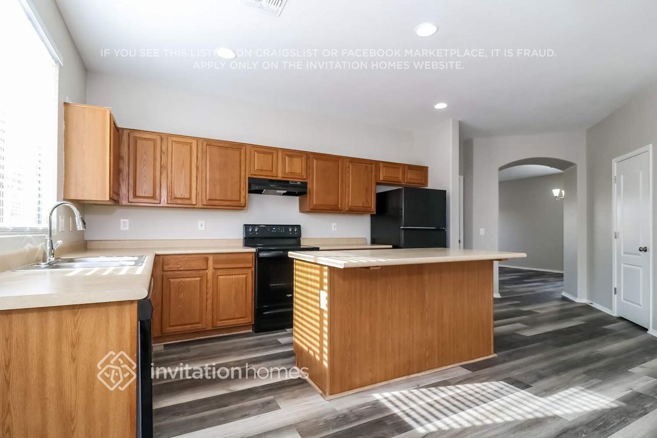 12420 W Woodland Ave - Photo 6 of 16