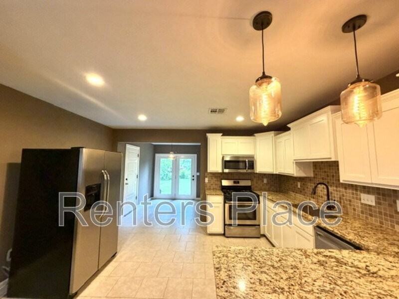 717 S Louisville Ave - Photo 4 of 17
