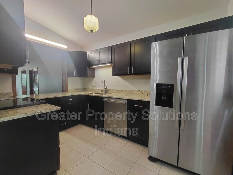 2312 W 65th Ave - Photo 3 of 9