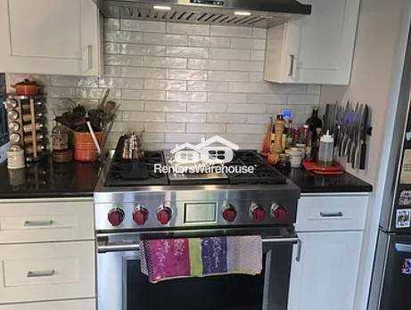3506 S Holly St - Photo 3 of 14