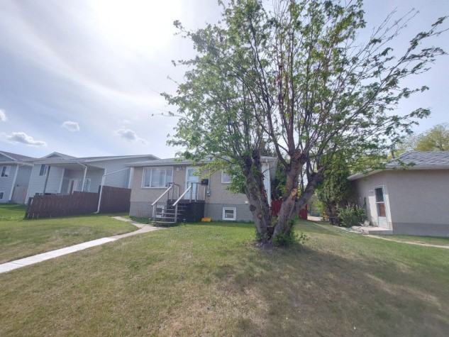4 BEDROOMS! GARAGE! FULLY FENCED YARD! - Photo 2 of 21