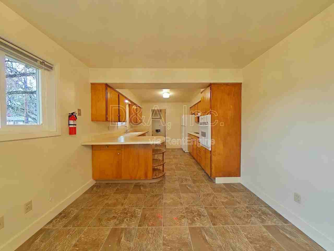 2220 Nw Elmwood Dr - Photo 3 of 13