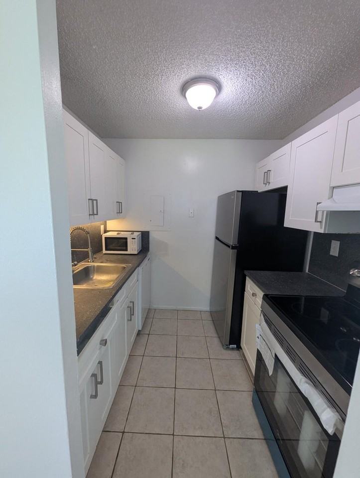 1203 N Benoist Farms Rd #107 - Photo 2 of 16