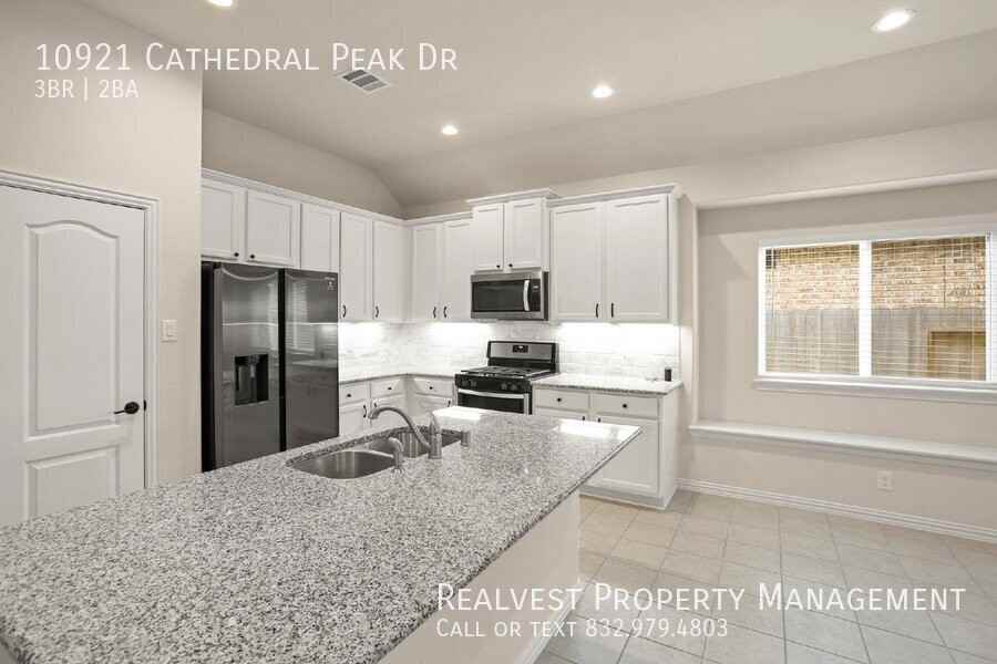 10921 Cathedral Peak Dr - Photo 5 of 19
