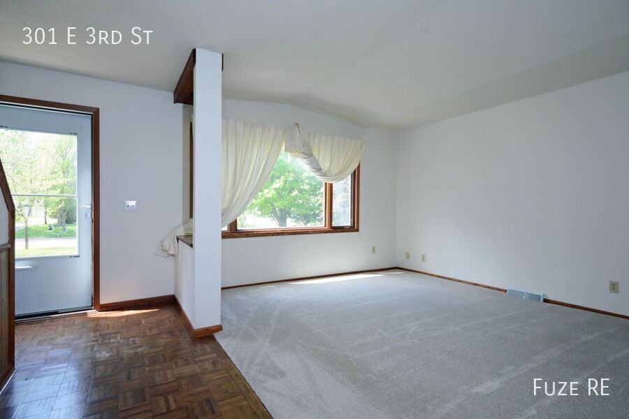 301 E 3rd St - Photo 2 of 15