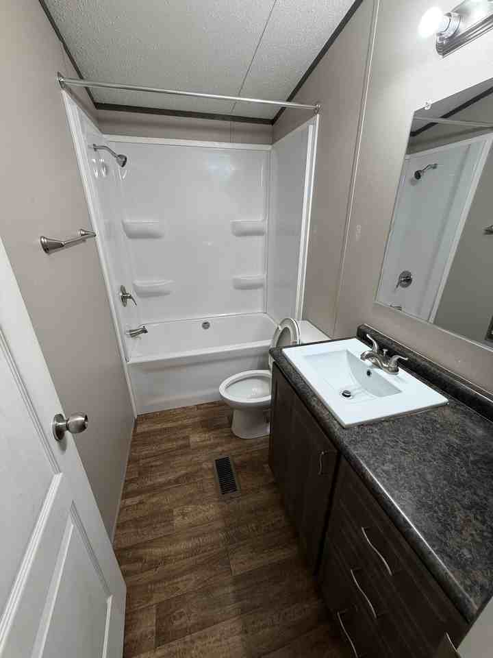 TJ's MHP - Photo 5 of 6