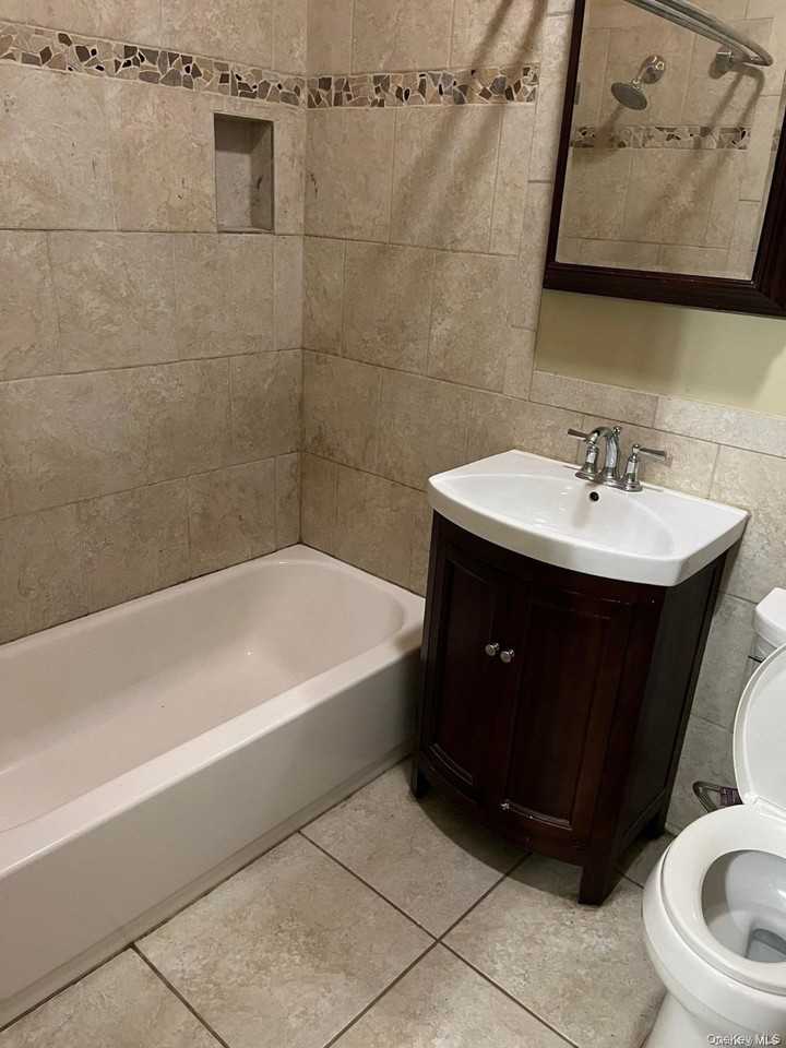 318 Jericho Tpke #1R - Photo 3 of 6
