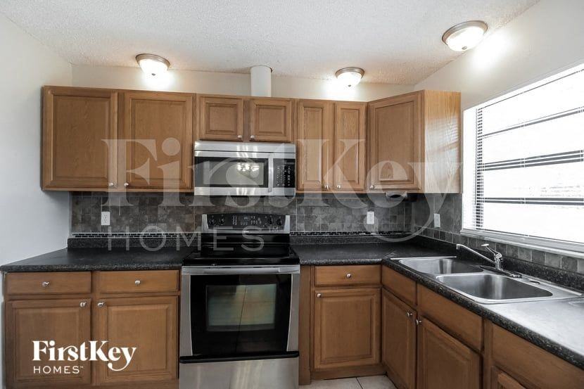 1180 Flintlock Ave Se - Photo 5 of 15
