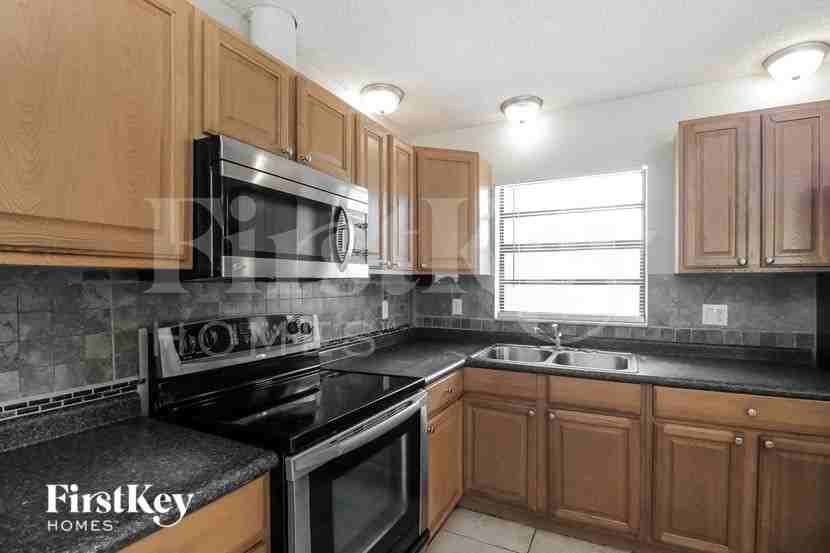 1180 Flintlock Ave Se - Photo 6 of 15