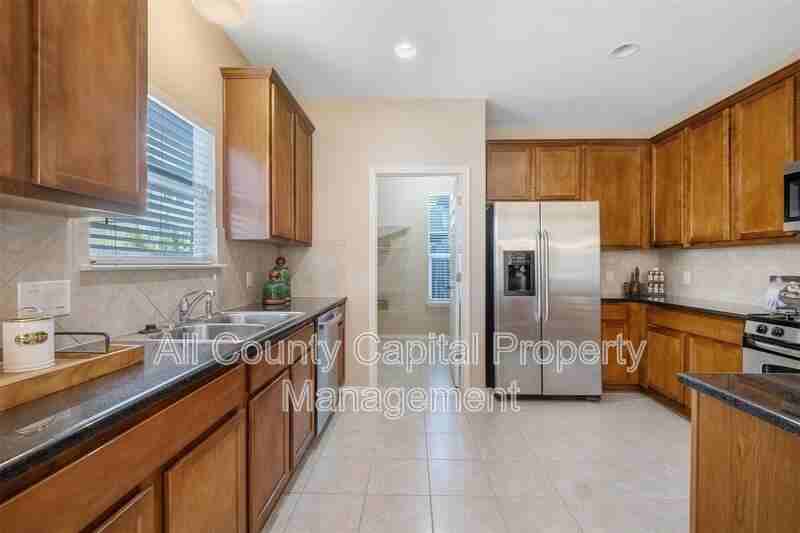 8700 Wood Stork Dr - Photo 3 of 23