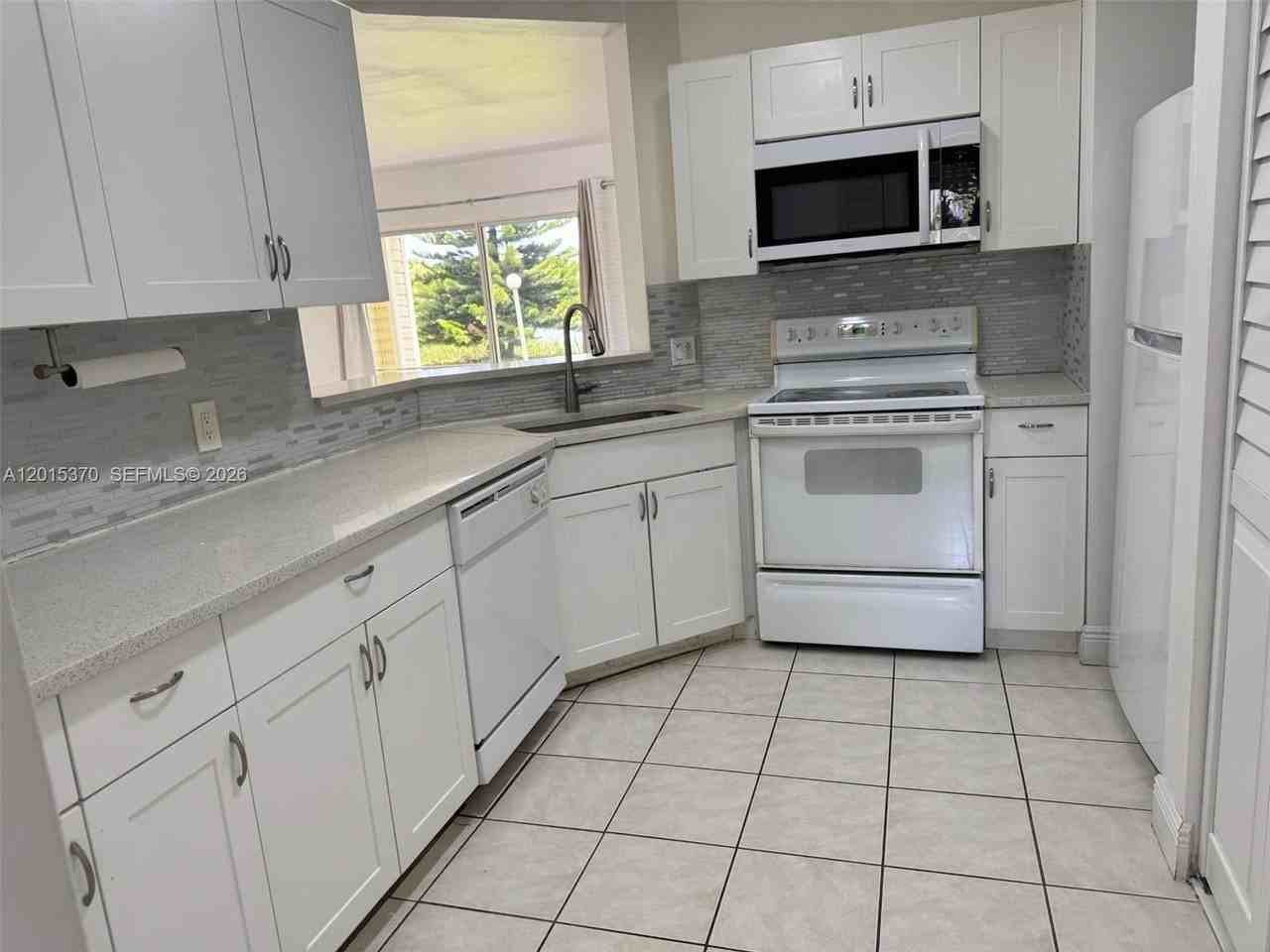 3441 Nw 44th St #104 - Photo 4 of 26