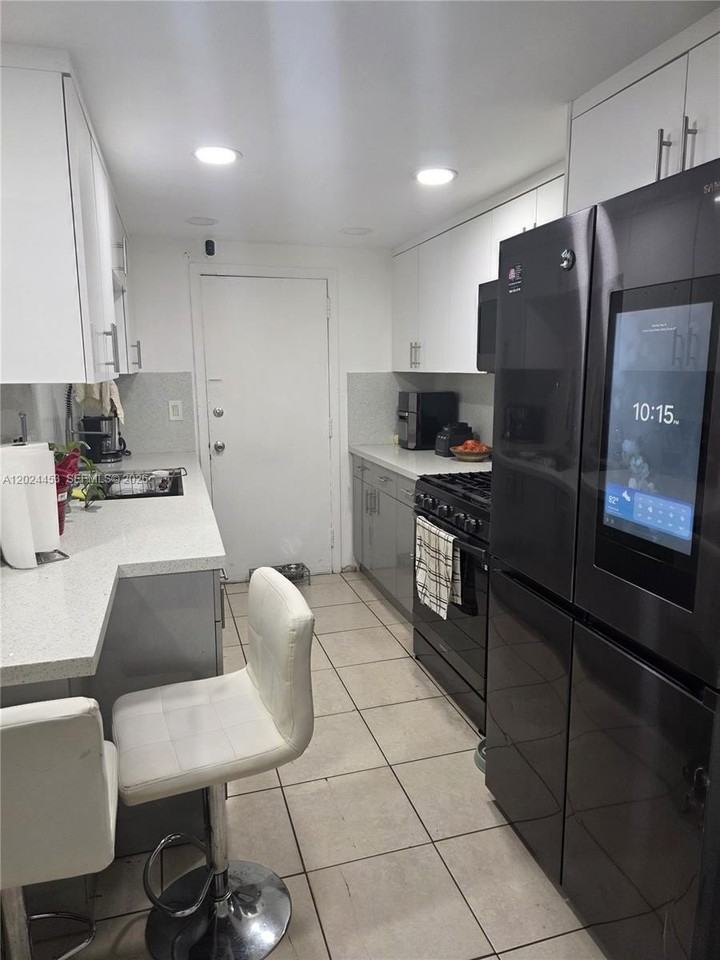 17901 Nw 68th Ave #T201 - Photo 6 of 23
