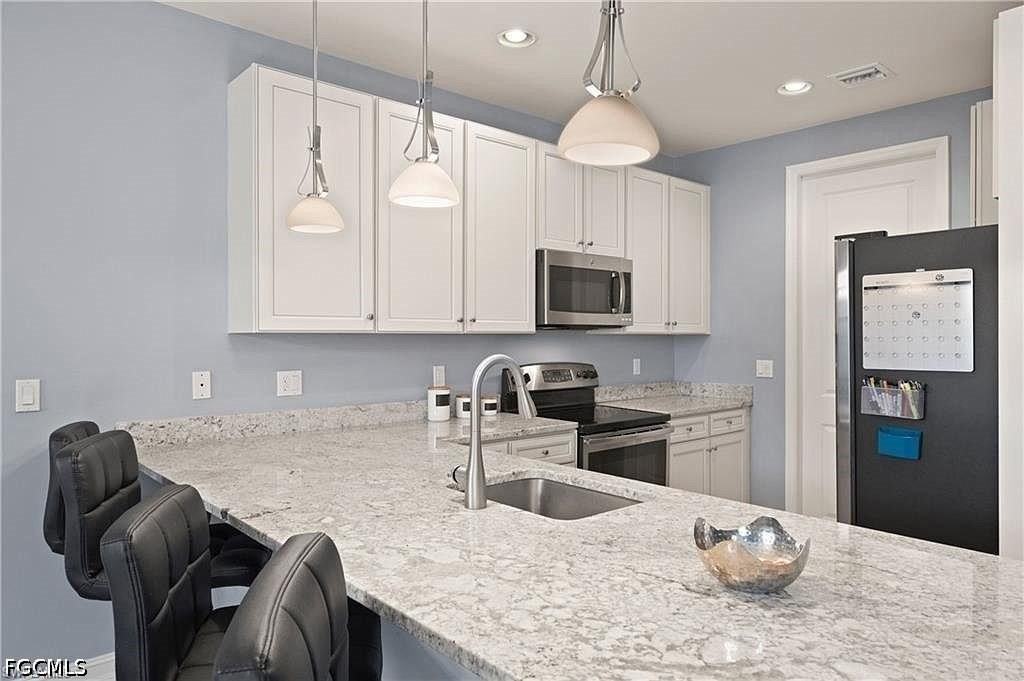 15800 Portofino Springs Blvd #102 - Photo 5 of 40