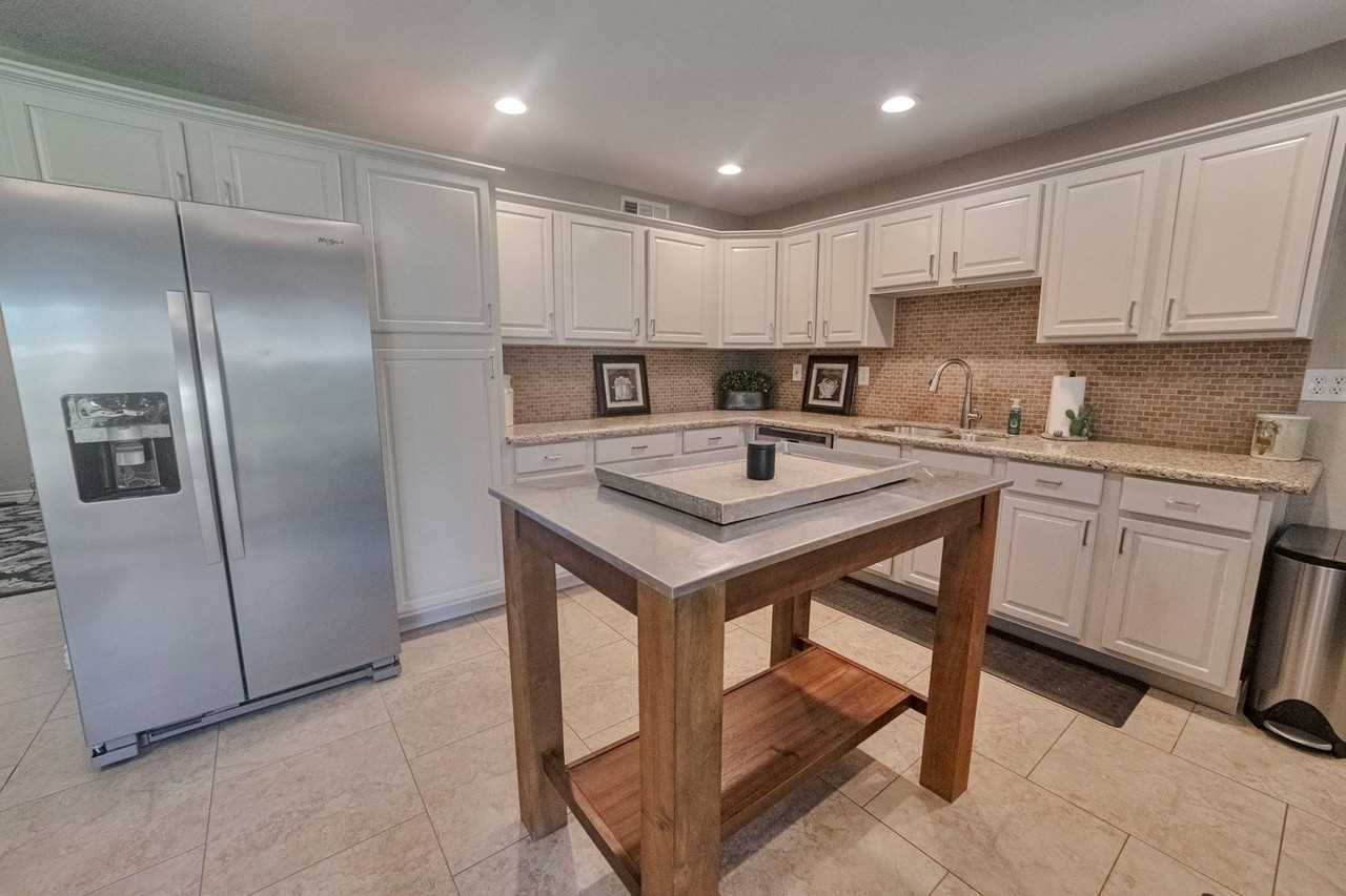 8737 E Plaza Ave - Photo 7 of 24