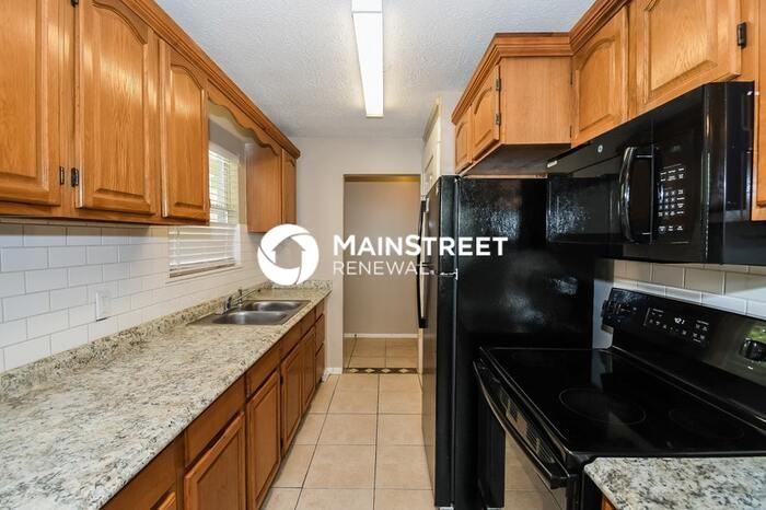 7037 Red Robin Dr - Photo 6 of 16