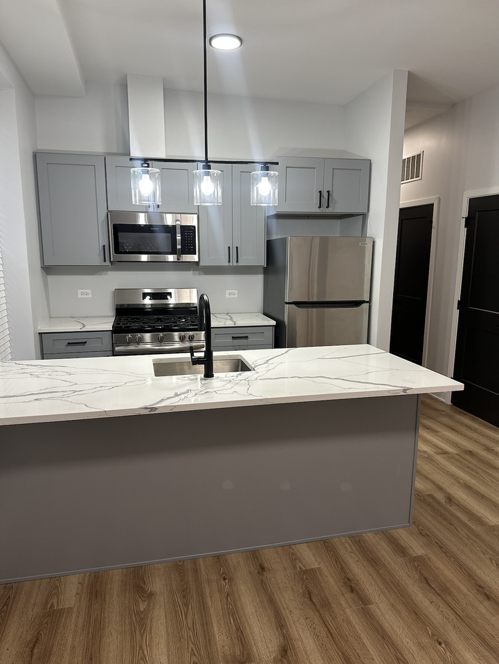 6554 S Champlain Ave #1 - Photo 2 of 9