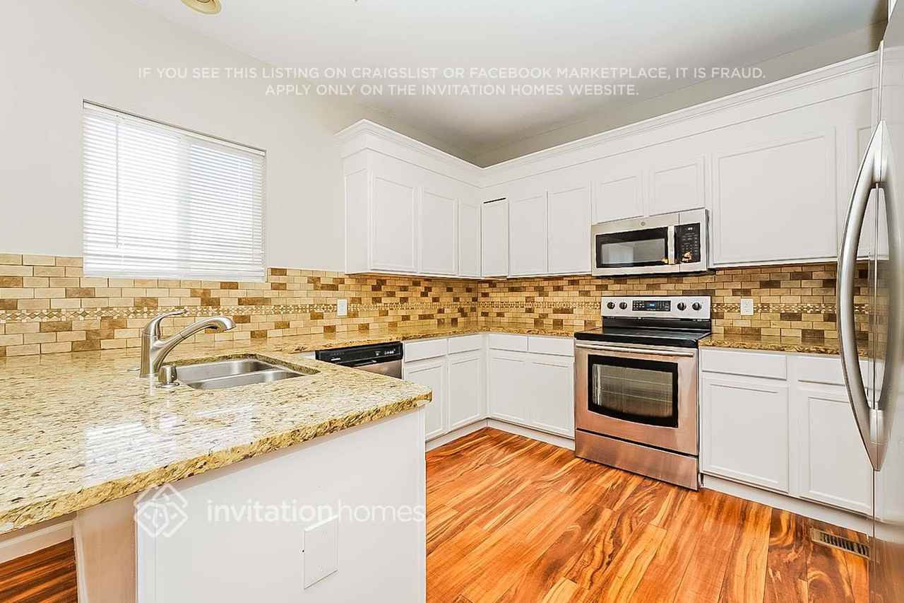 15645 E 99th Ave - Photo 5 of 16