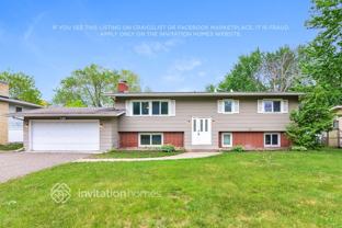8008 Colorado Ave N - Photo 1 of 1