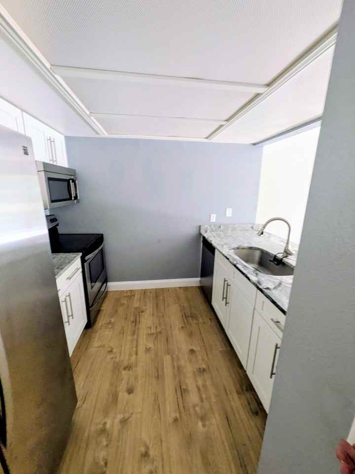 4896 S Dudley St #5-5 - Photo 3 of 13