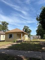 featured image of 928 E 3rd Ave
