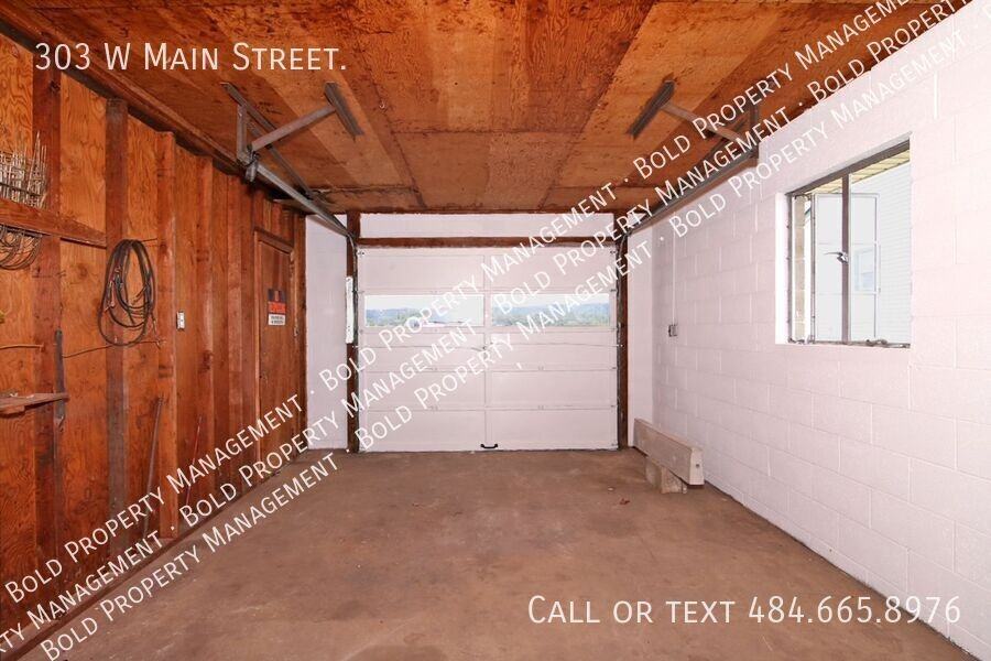 303 W Main St - Photo 3 of 26