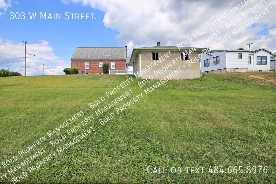 303 W Main St - Photo 4 of 26