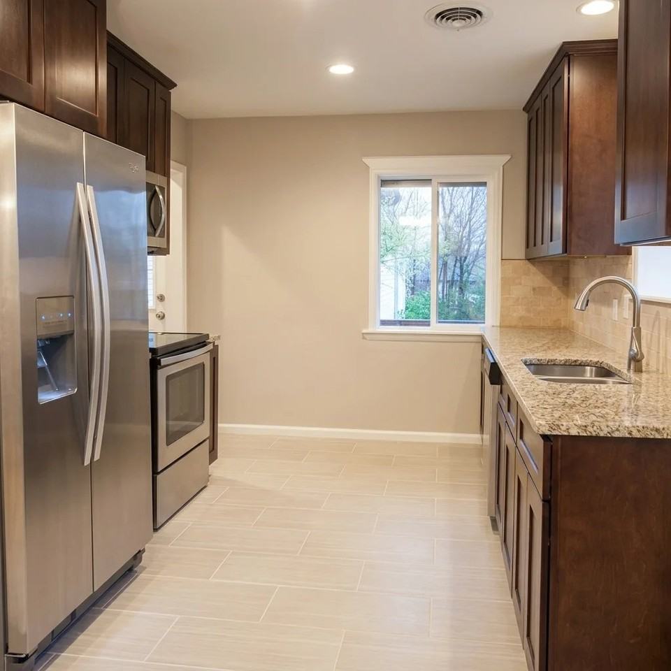 7739 Raleigh St - Photo 5 of 10