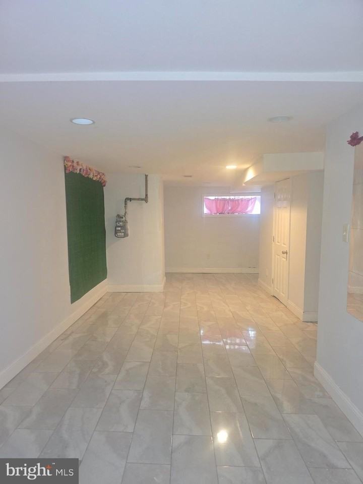 5538 Delancey St - Photo 4 of 8
