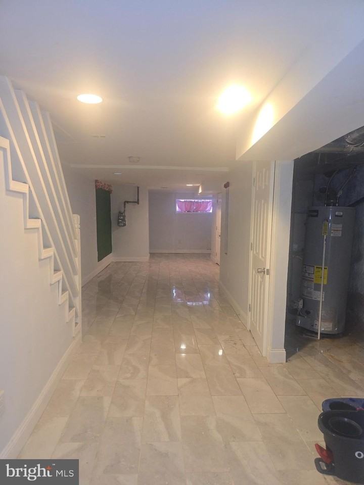 5538 Delancey St - Photo 5 of 8