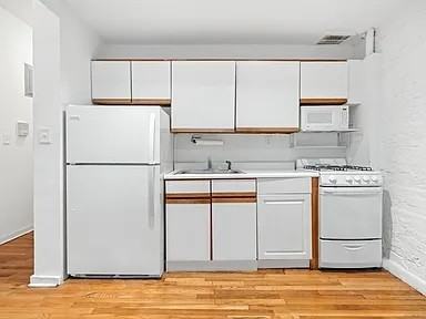 321 E 69th St - Photo 3 of 5