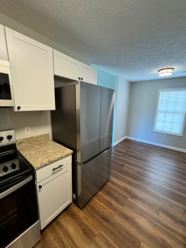 7005 Alamosa Dr - Photo 3 of 6