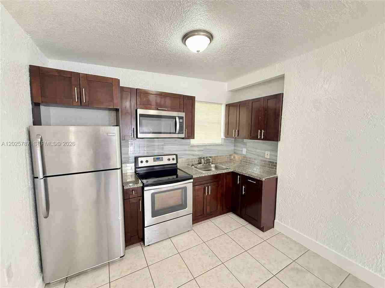 1345 Nw 55th St #2 - Photo 3 of 9