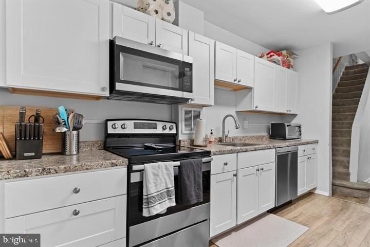 411 Herr St - Photo 5 of 8