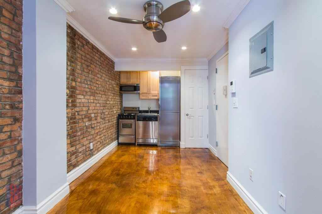 E 5th St #1A - Photo 3 of 4