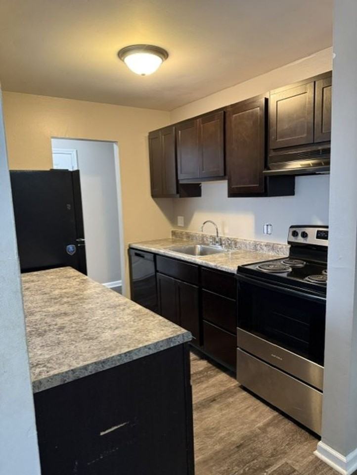 GRAYSTONE APARTMENTS - Photo 3 of 17