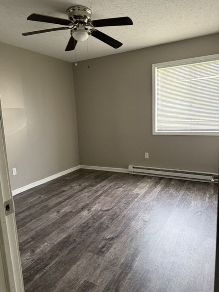 GRAYSTONE APARTMENTS - Photo 6 of 17