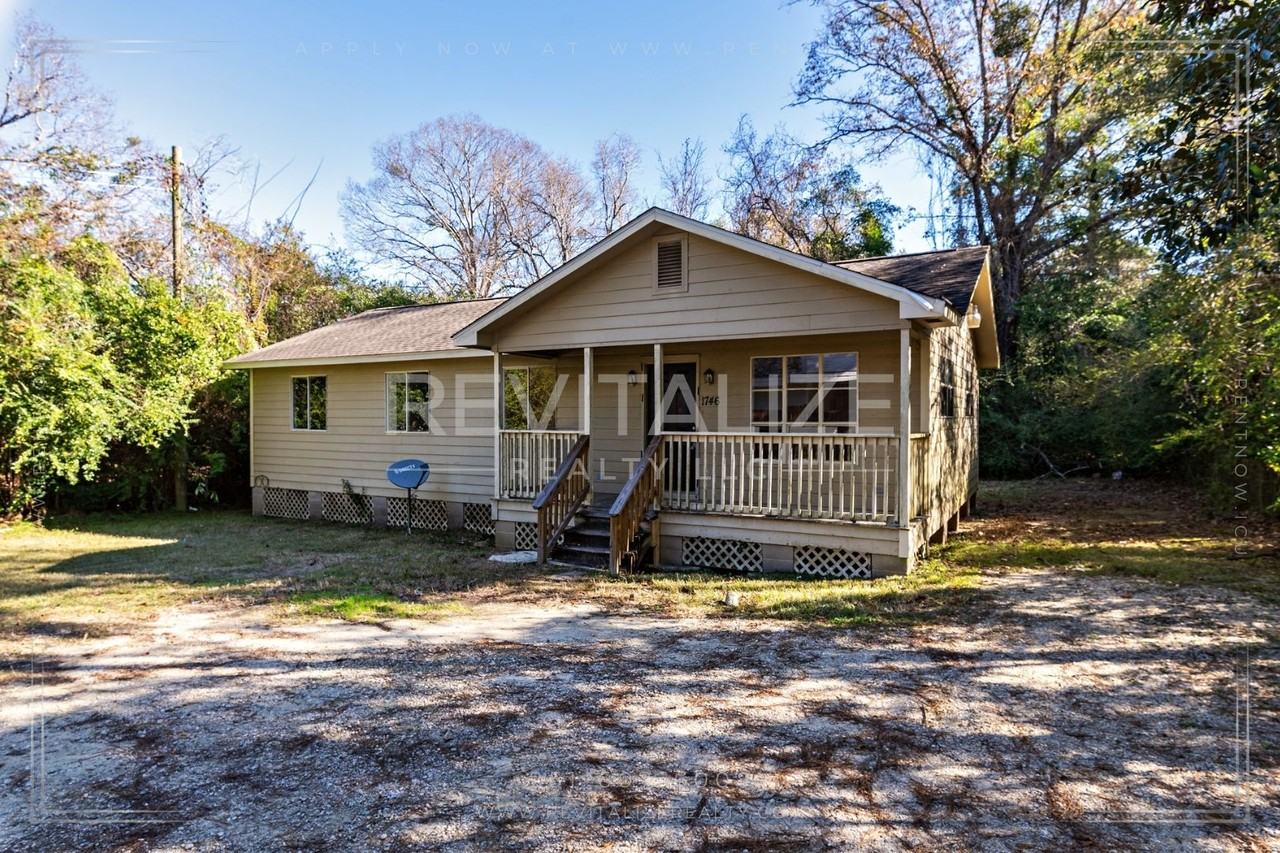 1746 Cody Rd N - Photo 5 of 36