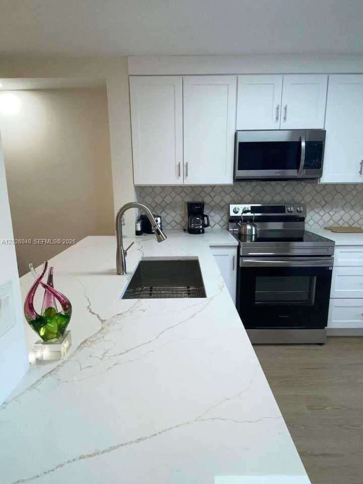 7350 Kinghurst Dr #305 - Photo 3 of 9