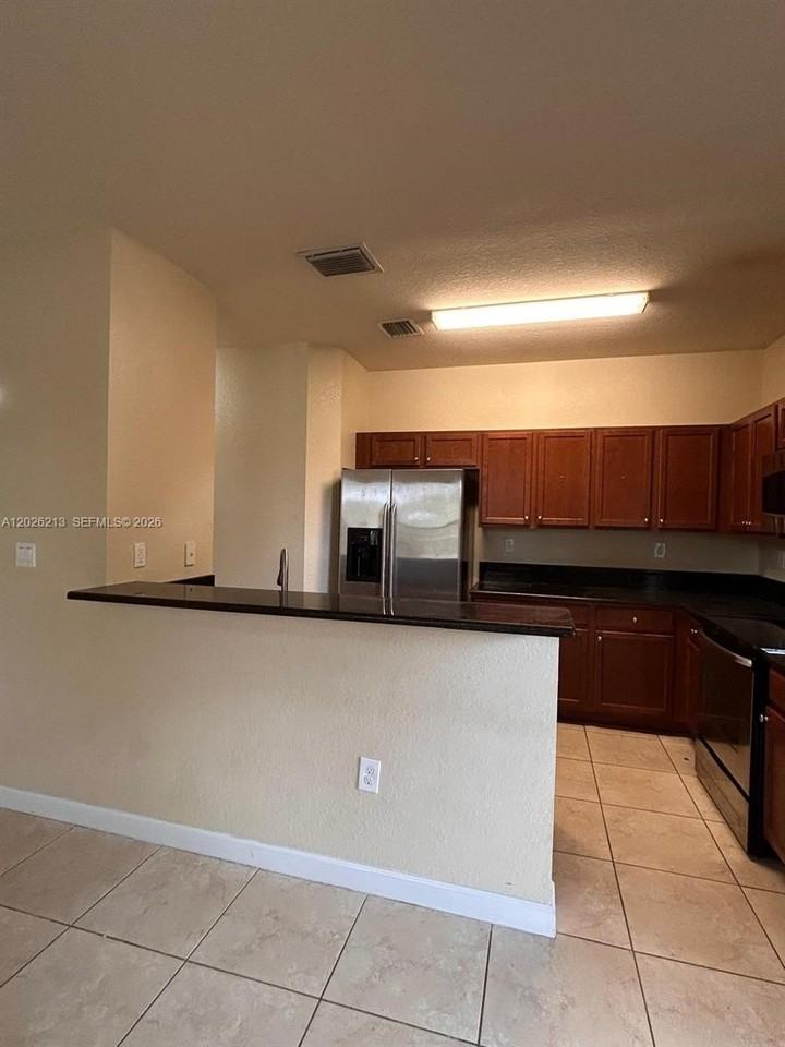 9153 Sw 227th St #9 - Photo 6 of 24