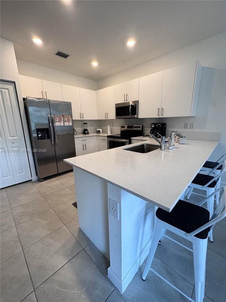 4664 Nw 120th Way - Photo 7 of 18