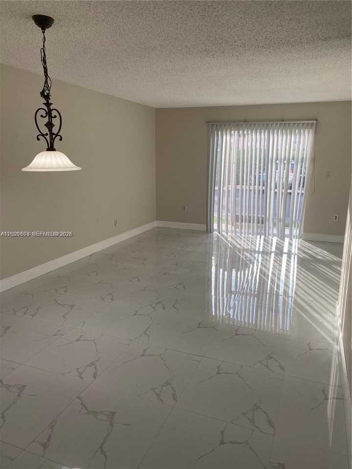 11307 Sw 200th St #106B - Photo 2 of 12