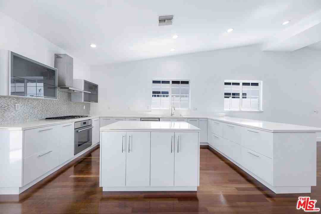 12719 Tiara St - Photo 4 of 8